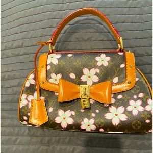 Ladies pretty floral handbag with leather bow